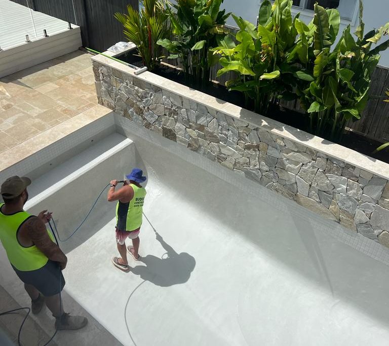 Once your pool fencing requirements are completed and approved by the certifier, the pool interior will be completed. Our Pebble crete interiors are usually acid washed in the afternoons however if your pool is completed late afternoon it will be acid washed the next morning. You will need to leave a hose on site as once the pebble crete is acid washed they will put your hose in the pool and the pool will start filling.